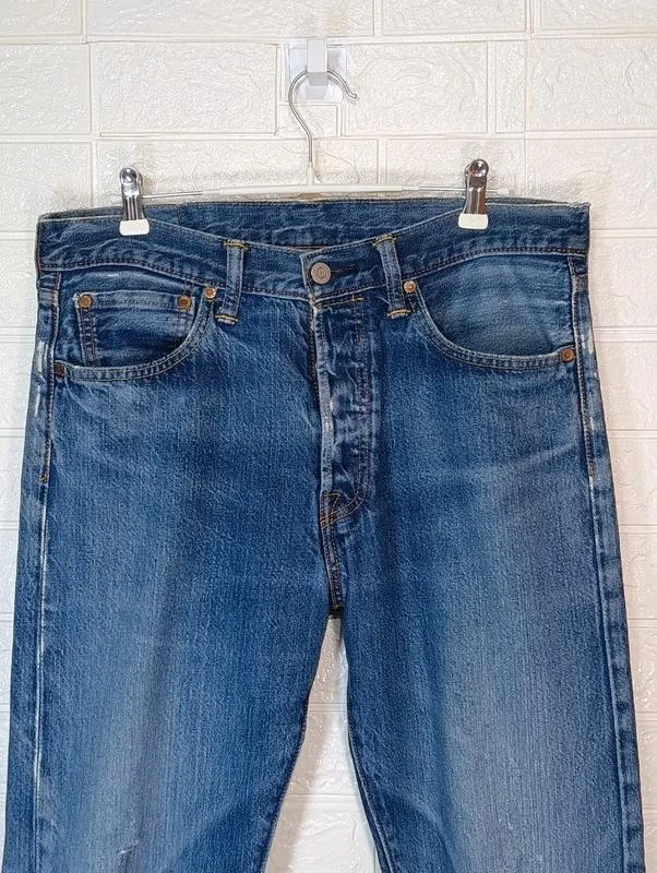 Pantalón Leví's 501 efecto roto 32 / 34